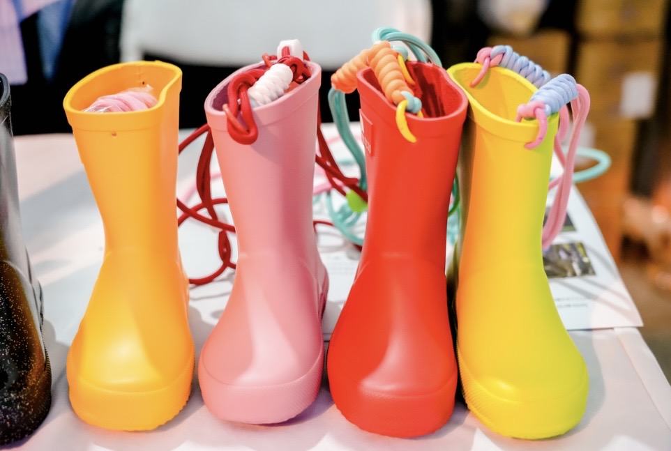 bright-patcus-children-rubber-rain-boots-on-trade-fair-table